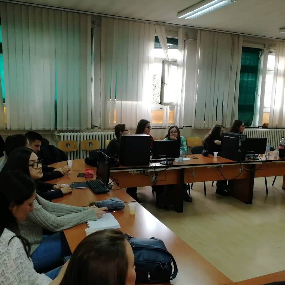 view of a classroom with students attending a marketing class