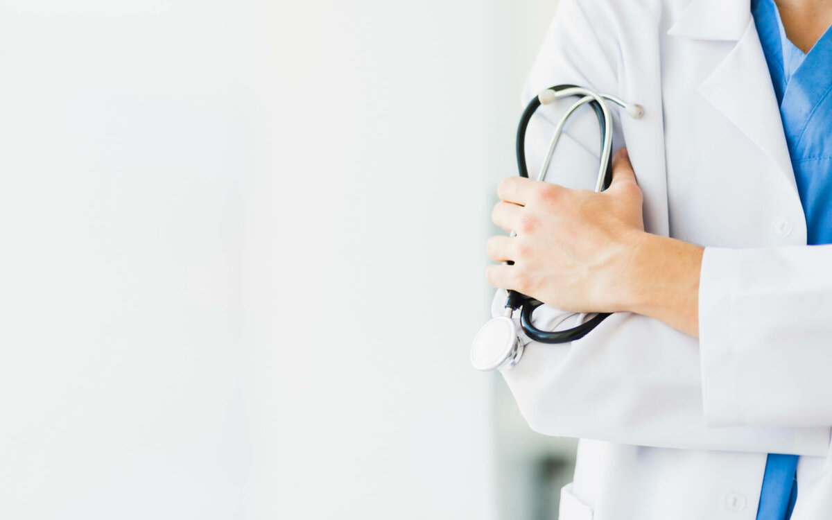 doctor-holding-stethoscope doctor-holding-stethoscope